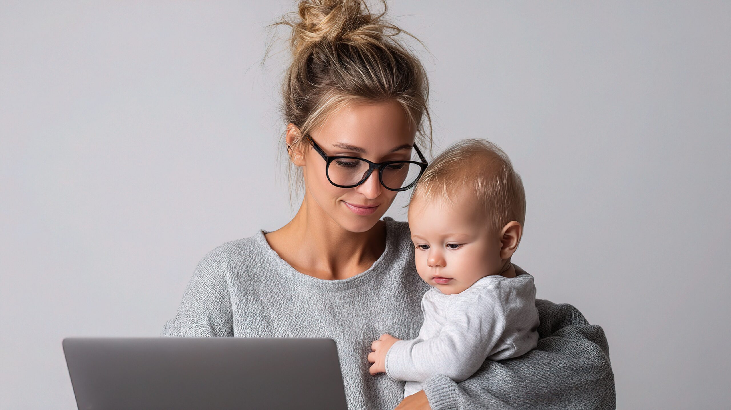 A parent using a laptop to log in to their Tax-Free Childcare account on the GOV.UK website, managing childcare payments and updating details in a secure, user-friendly portal designed to support working families.